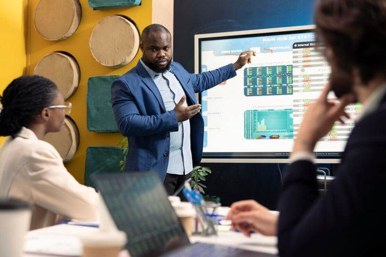 marketing-team-sharing-details-annual-reports-enterprise-meeting_482257-89286